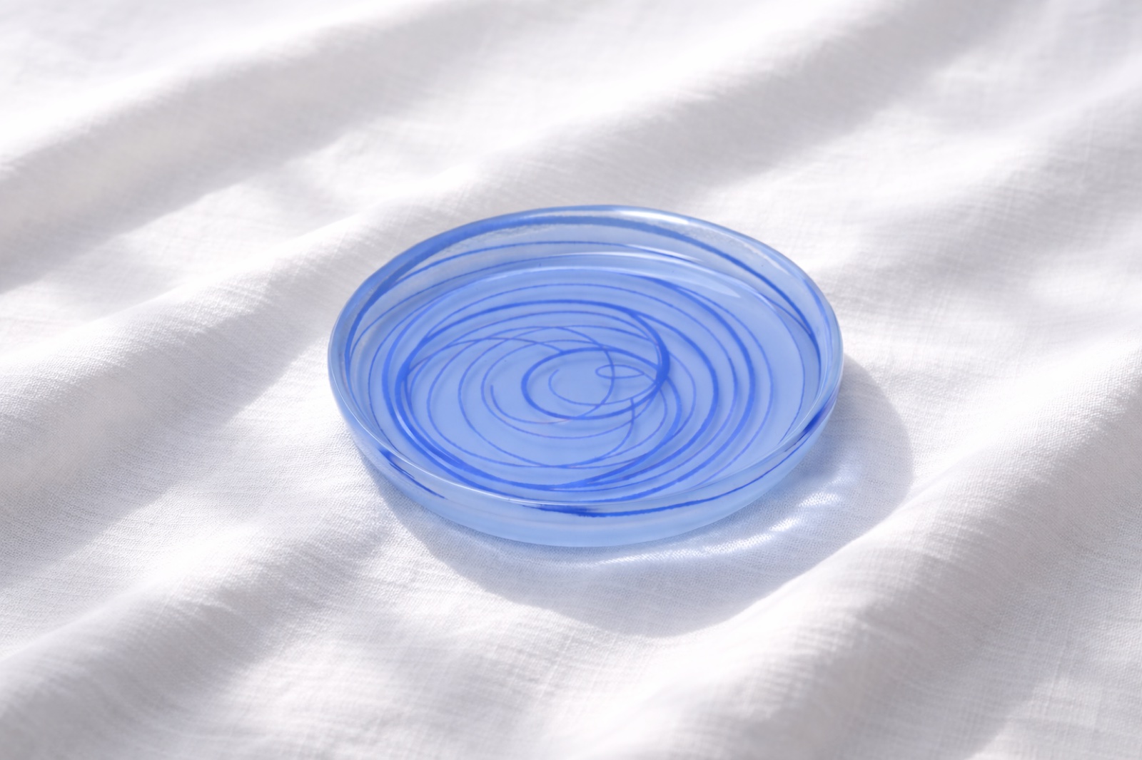 Swirl bowl in cobalt on linen